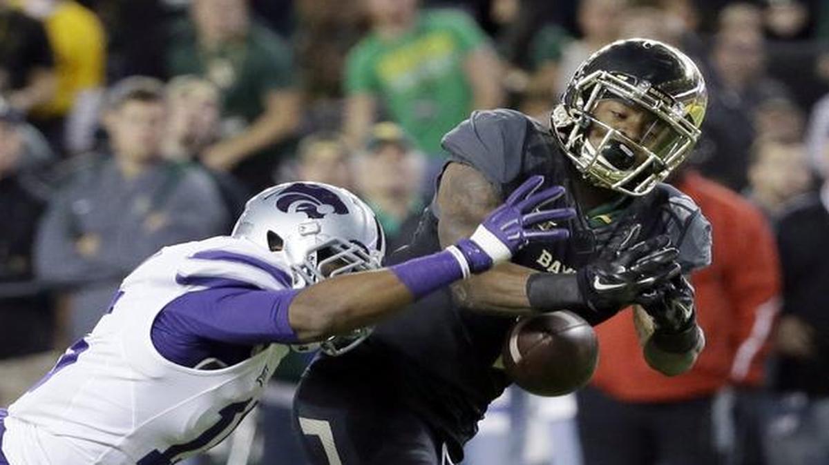 
Kansas State’s Randall Evans broke up a pass intended for Baylor’s Corey Coleman during a 2014 game.
