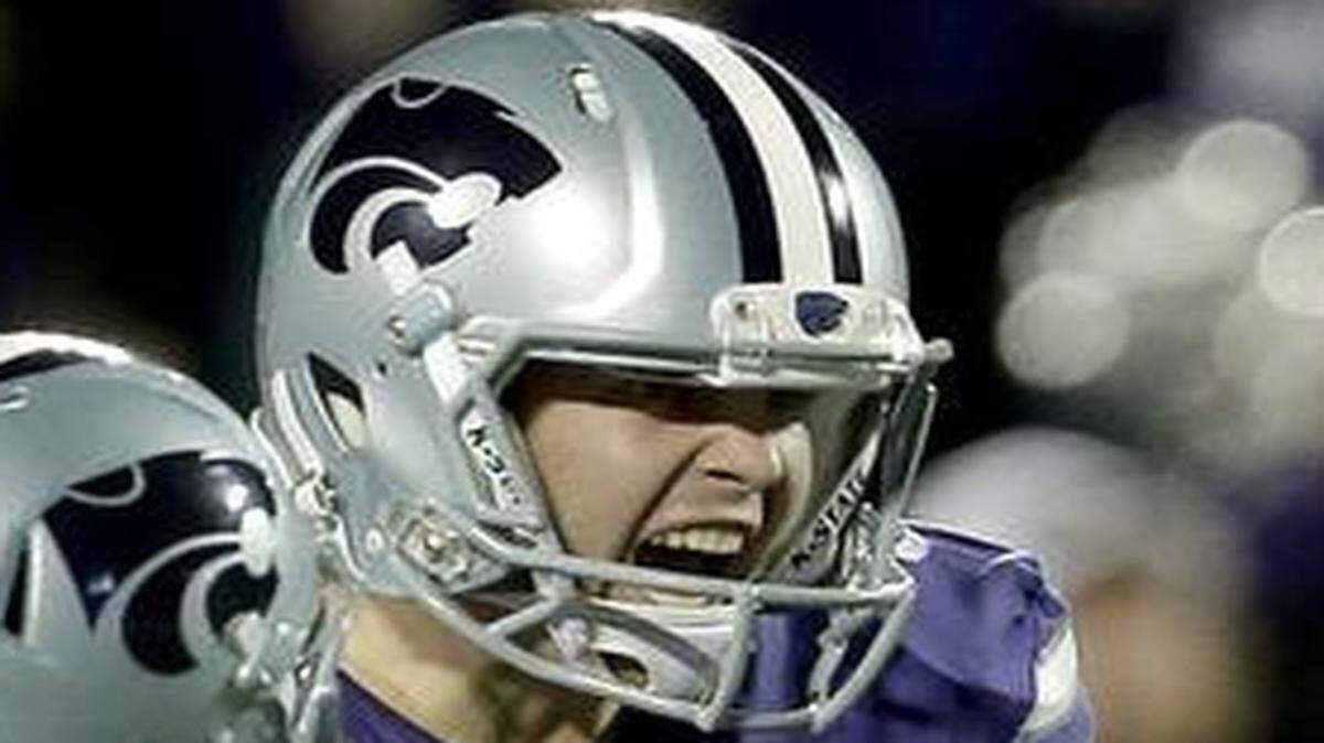 
Kansas State kicker Jack Cantele (right) kicked a 41-yard field goal that beat TCU on Nov. 16, 2013, in Manhattan, Kan.
