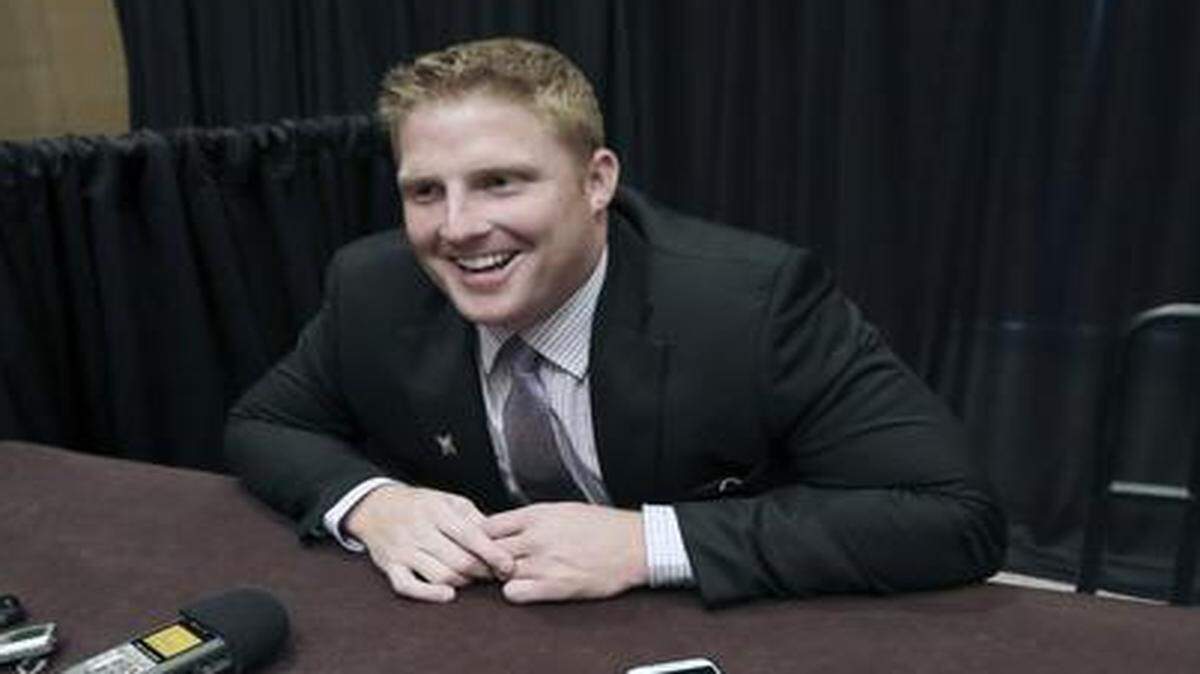 
Kansas State defensive end Ryan Mueller smiles as he speaks to reporters Tuesday during Big 12 media days in Dallas.
