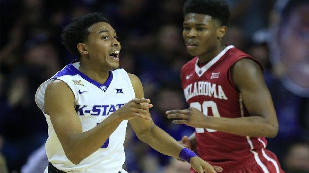 Kansas State guard Kamau Stokes (left) scored 13 points in the Wildcats’ 75-64 win over Oklahoma on Saturday in Manhattan, Kan.