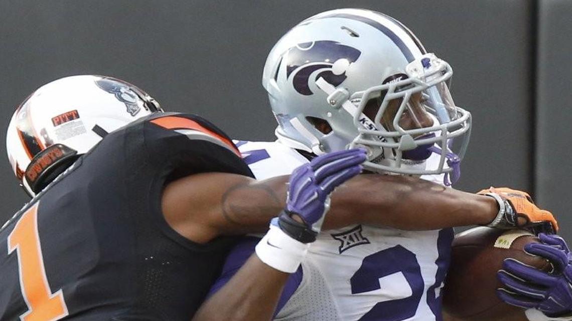 
Kansas State running back Charles Jones was driven out of bounds after a 72-yard pass play late in Saturday’s game against Oklahoma State.
