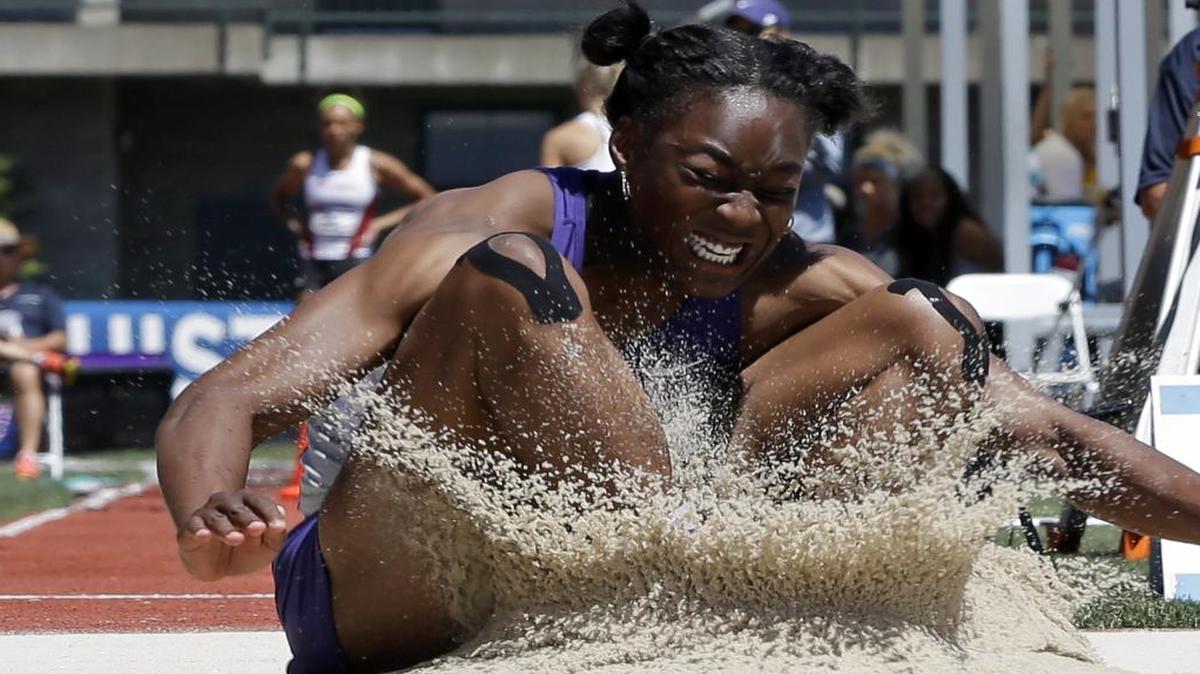 
Kansas State's Akela Jones lands in the sand pit during the long jump event of the heptathlon competition at the NCAA track and field championships in Eugene, Ore., last week (June 11, 2015) 
