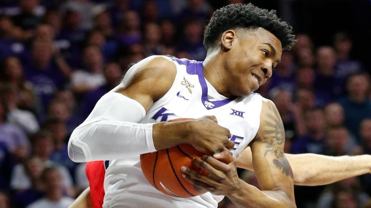 Kansa State forward Wesley Iwundu (25) pulled down a rebound against Mississippi as the Wildcats and Rebels played as part of the Big 12/SEC Challenge on Saturday in Manhattan, Kan. The Wildcats won the game 69-64.