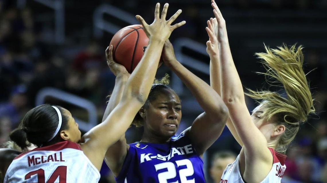 Kansas State forward Breanna Lewis was surrounded by Stanford’s Erica McCall (left) and Karlie Samuelson in the second half of Monday’s second-round game in the NCAA women’s tournament in Manhattan, Kan. Lewis had 9 points and 4 rebounds in the Wildcats’ 69-48 loss.