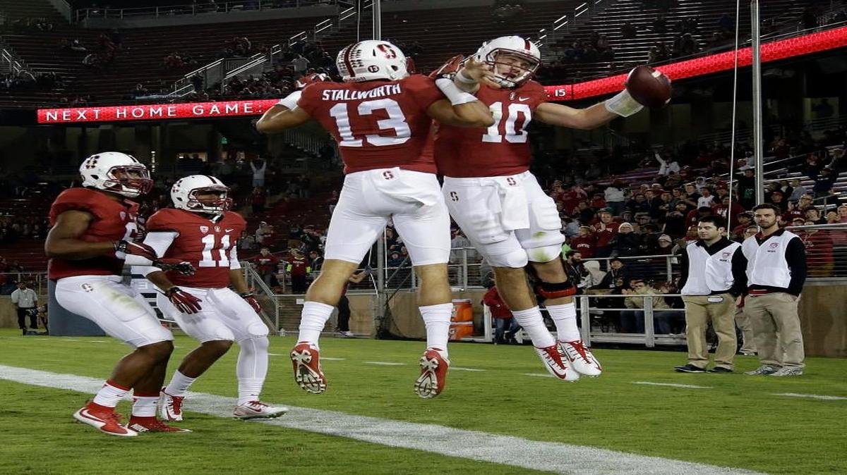 
Stanford quarterback Keller Chryst celebrates a touchdown against Arizona on Saturday, Oct. 3, 2015, in Stanford, Calif. 
