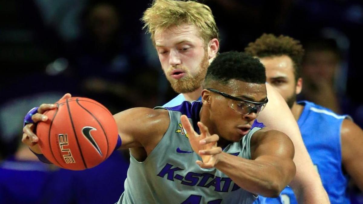 Kansas State forward Stephen Hurt (41) drives on Columbia center Conor Voss ( back) during Monday’s NCAA college basketball game in Manhattan, Kan.