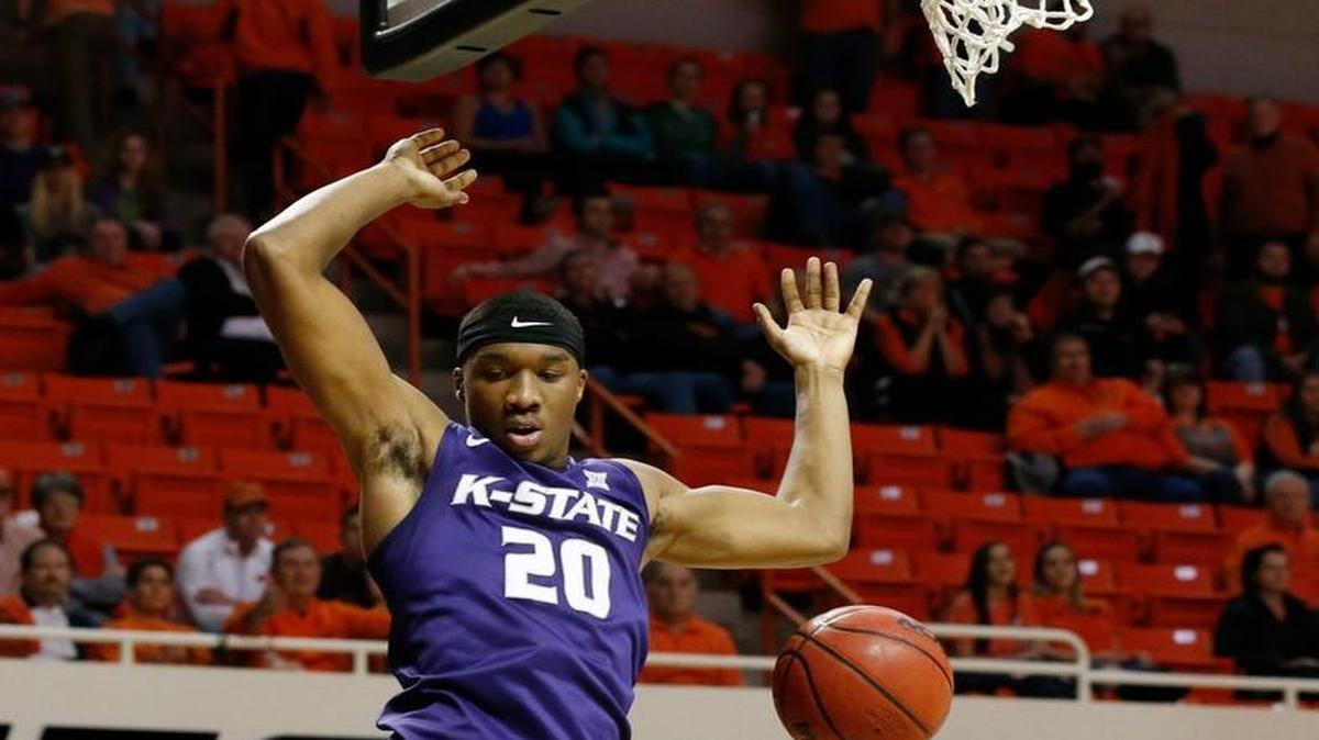 Kansas State forward Xavier Sneed dunks during a victory at Oklahoma State. (AP Photo/Sue Ogrocki)