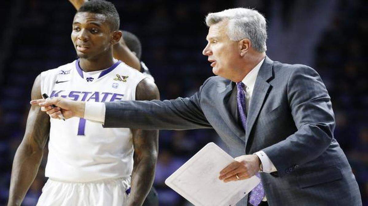 
Jevon Thomas (left), a sophomore point guard, did not travel with K-State for its last game, a 62-49 loss at Texas, for undisclosed reasons. Coach Bruce Weber said Monday that Thomas has rejoined the team and is expected to play Wednesday night against TCU in the Big 12 Tournament.

