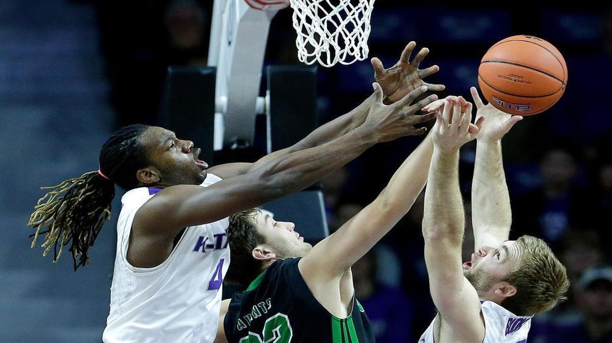 Kansas State’s Austin Budke (35) and D.J. Johnson battled North Dakota’s Conner Avants (32) for a rebound in the first half Tuesday night at Bramlage Coliseum in Manhattan, Kan.