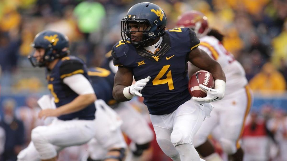 West Virginia running back Wendell Smallwood carries the ball last Saturday against Iowa State. The Mountaineers have won four in a row.