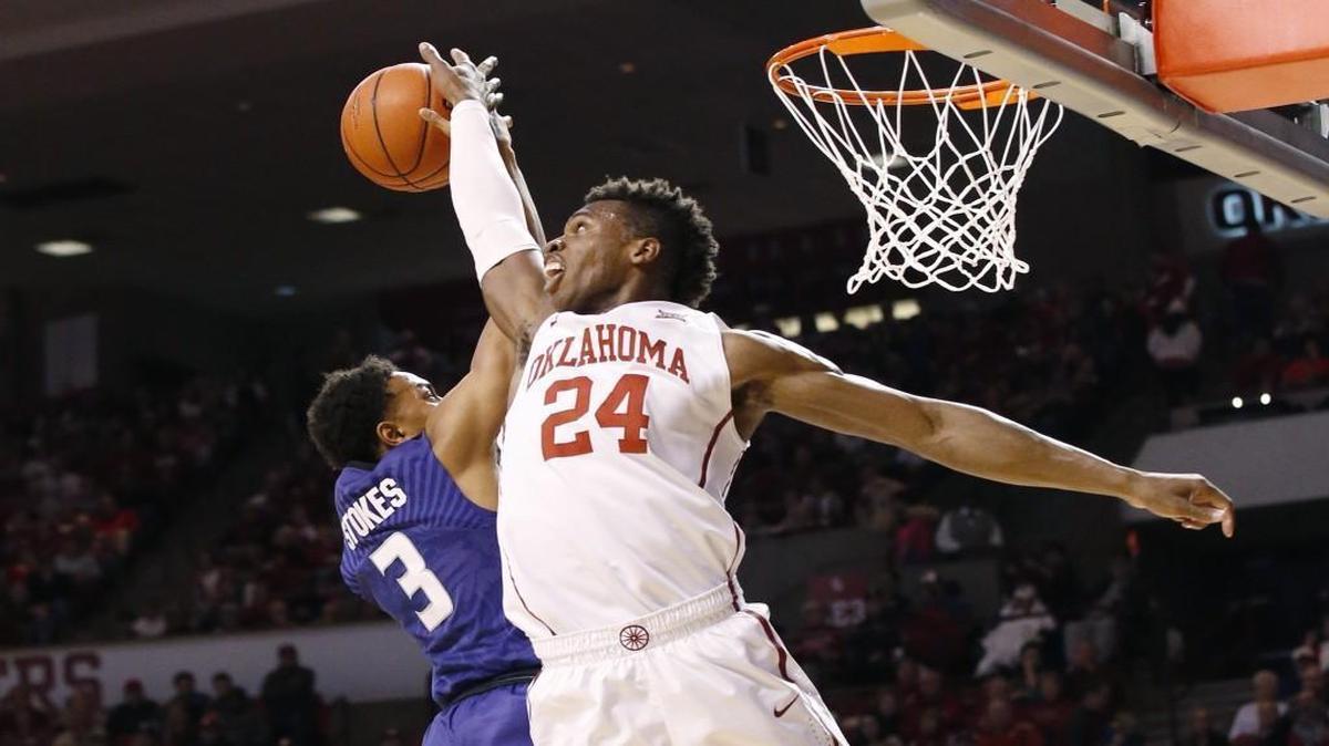 Oklahoma guard Buddy Hield (24) blocked a shot by Kansas State guard Kamau Stokes in the first half Saturday in Norman, Okla.