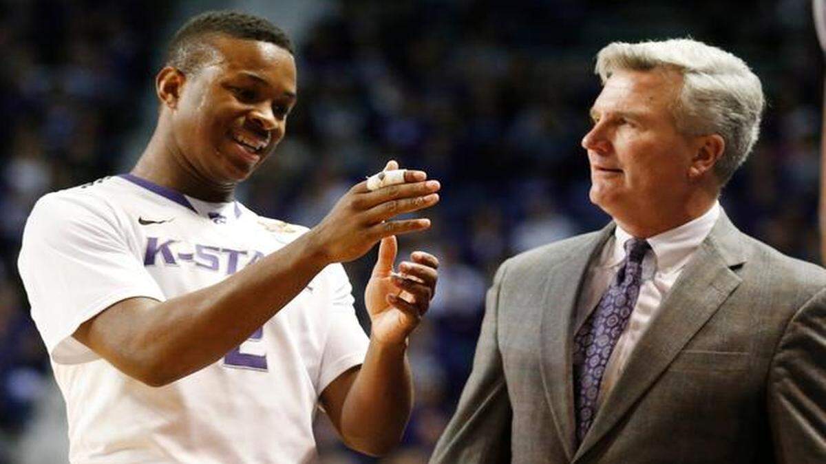 
K-State coach Bruce Weber listens to K-State guard Marcus Foster as Foster comes out of a game last season against West Virginia.
