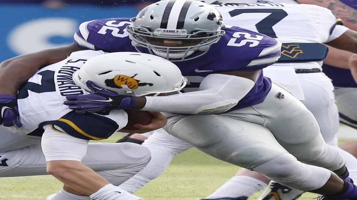 Kansas State linebacker Charmeachealle Moore had 17 tackles against West Virginia on Saturday.