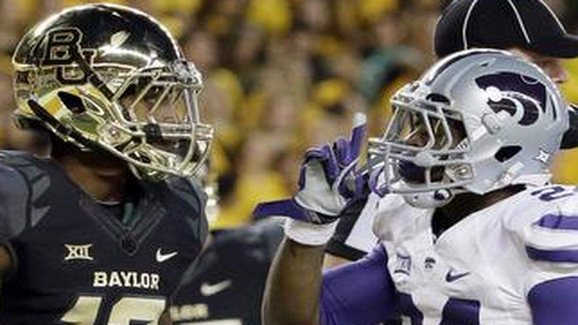
Kansas State running back Charles Jones (24) gestured to Baylor fans in front of the Bears’ Alfred Pullom (12) after scoring on a running play in the first half on Saturday night in Waco, Texas. 
