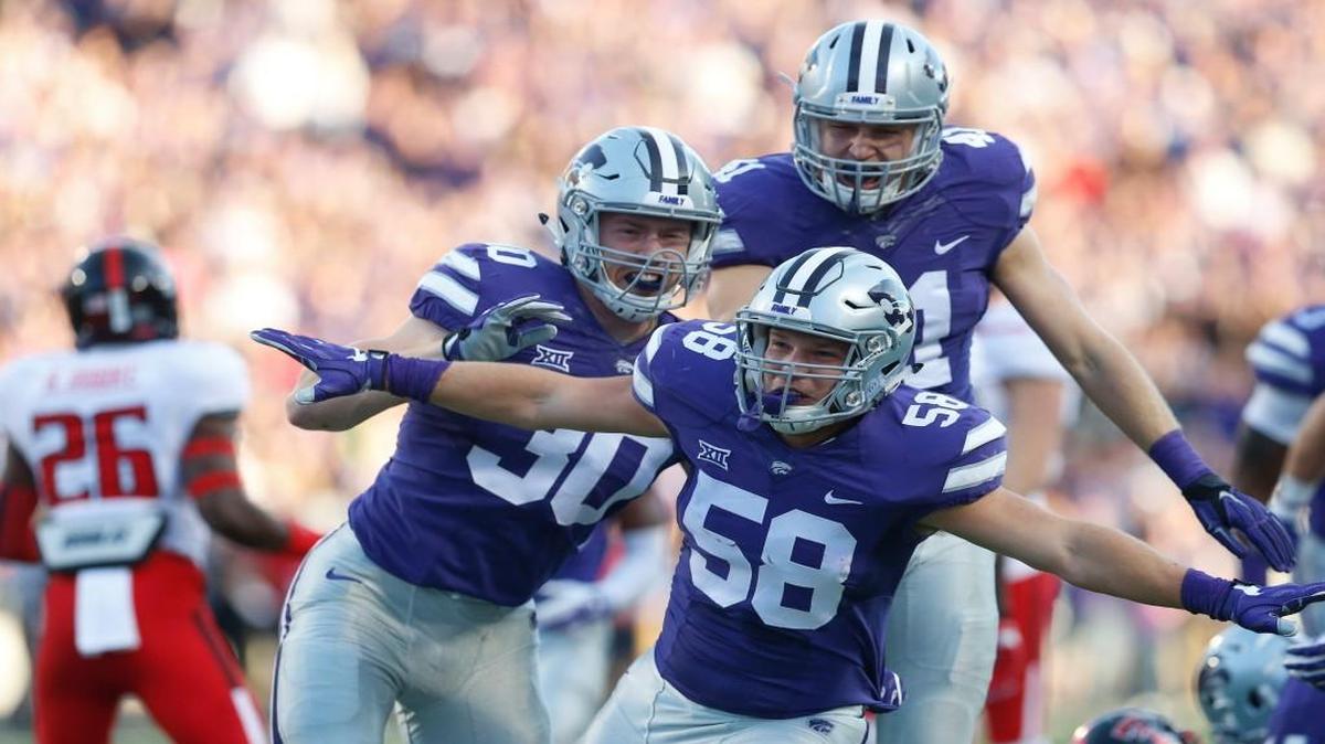 K-State linebacker Trent Tanking (58) celebrates after a big play against Texas Tech.