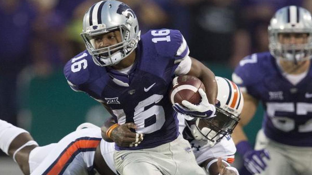 
Kansas State Wildcats wide receiver Tyler Lockett (16) shook off a diving tackle by Auburn defensive back Robenson Therezie in a game last September. 
