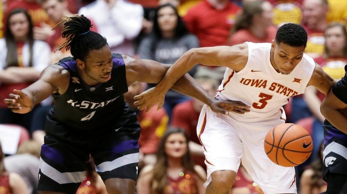 Kansas State forward D.J. Johnson (left) and Iowa State guard Hallice Cooke chased after a loose ball in the first half as the Wildcats and Cyclones played Saturday in Ames, Iowa.