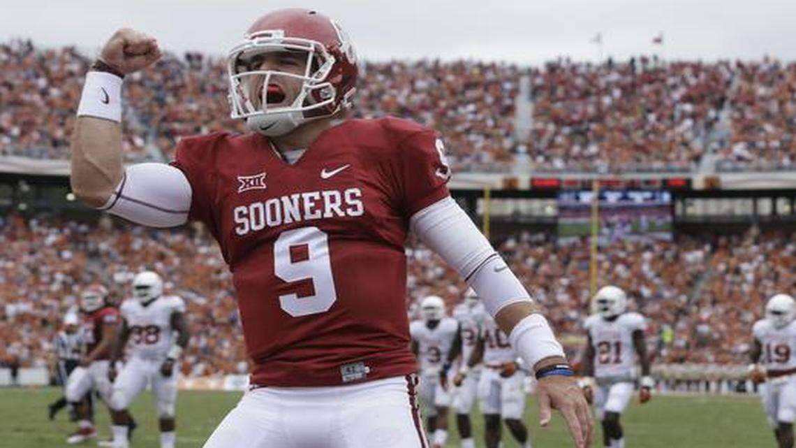 
Oklahoma quarterback Trevor Knight celebrates a touchdown against Texas. 
