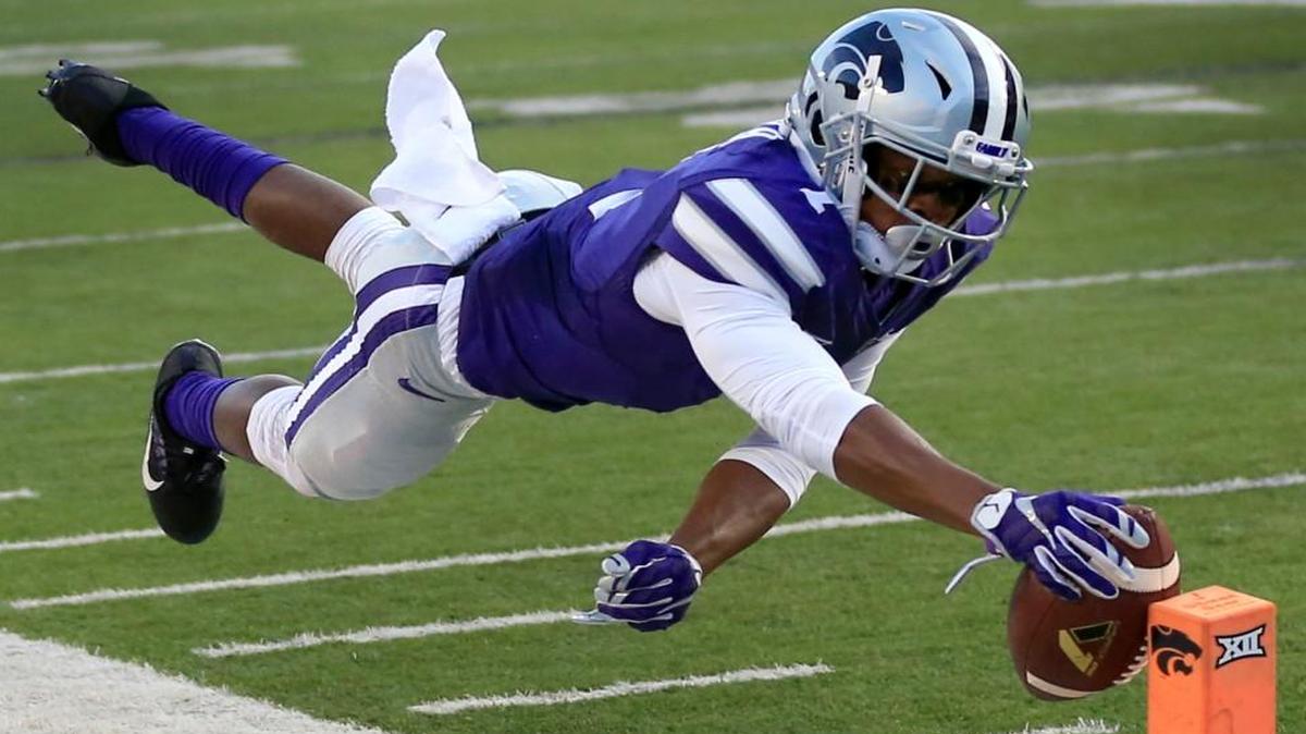 Kansas State wide receiver Isaiah Zuber dived for the pylon and a touchdown in the first half of Saturday’s game against Texas Tech in Manhattan, Kan.