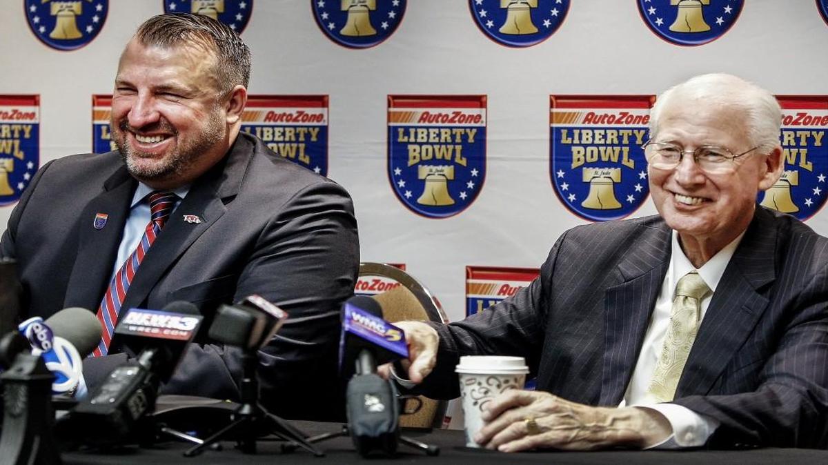 In this Dec. 10, 2015 file photo, Kansas State coach Bill Snyder (left) and Arkansas coach Bret Bielema took part in a news conference for the Liberty Bowl.