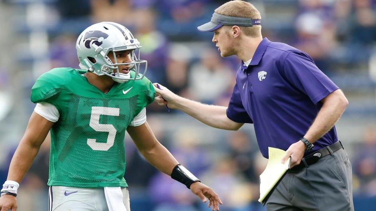 Freshman quarterback Alex Delton gets some words from K-State graduate assistant Collin Klein (April 25, 2015)