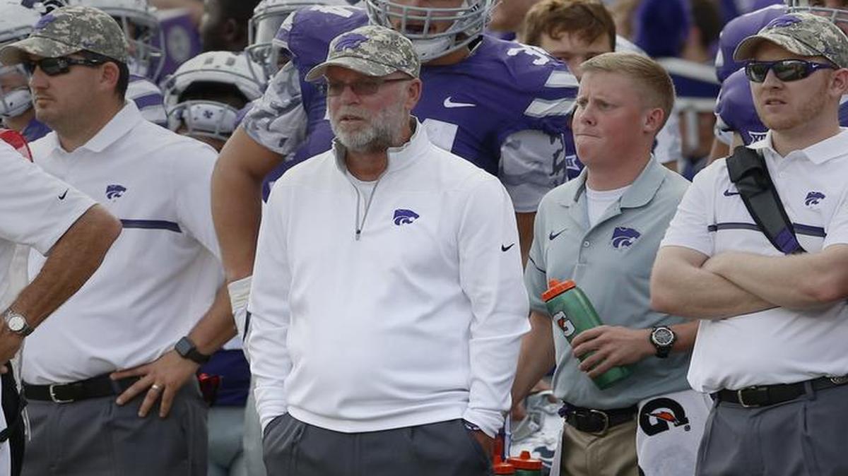 Jerry Kill (center) watched K-State take on Oklahoma State this season. The former Minnesota coach became the new offensive coordinator at Rutgers on Monday.