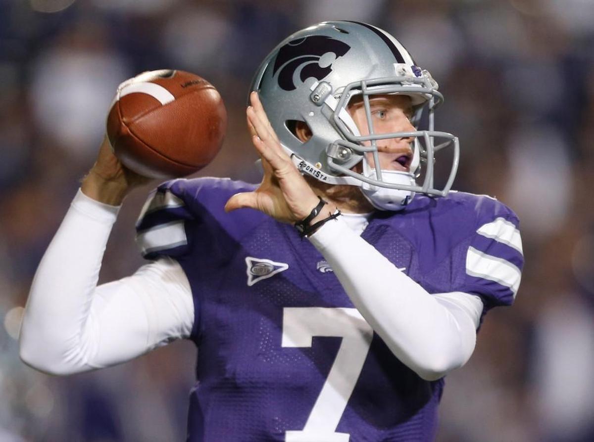 Kansas State Wildcats quarterback Collin Klein in action against the Oklahoma State Cowboys on November 3, 2012. Had the proposed College Football Playoff format been in place that season, the Wildcats would have been the No. 2 seed.