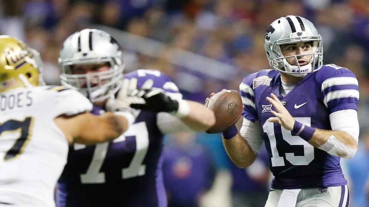 
K-State left guard Boston Stiverson (77) protects quarterback Jake Waters at the Alamo Bowl.
