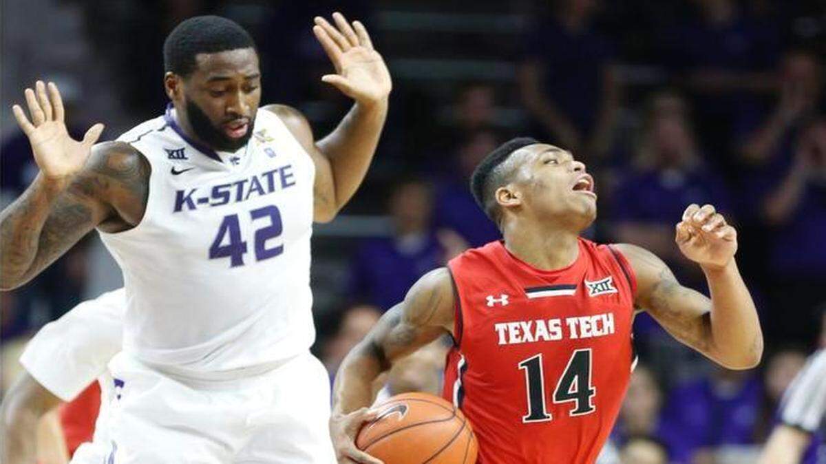 
Texas Tech guard Robert Turner exaggerates his expression as he draws a foul on K-State forward Thomas Gipson during K-State’s seven-point win in January.

