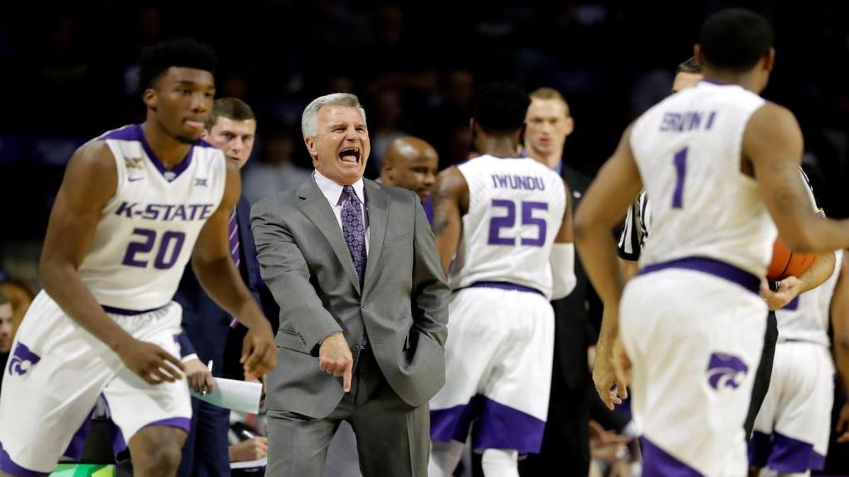 Kansas State coach Bruce Weber talks to his players during a college basketball game against Western Illinois. (AP Photo/Charlie Riedel)