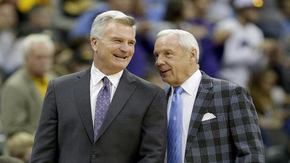 Kansas State coach Bruce Weber (left) says he has come to appreciate his team’s games in Kansas City and in Wichita. Weber and K-State took on Roy Williams’ North Carolina team at the Sprint Center in Kansas City on Nov. 24.
