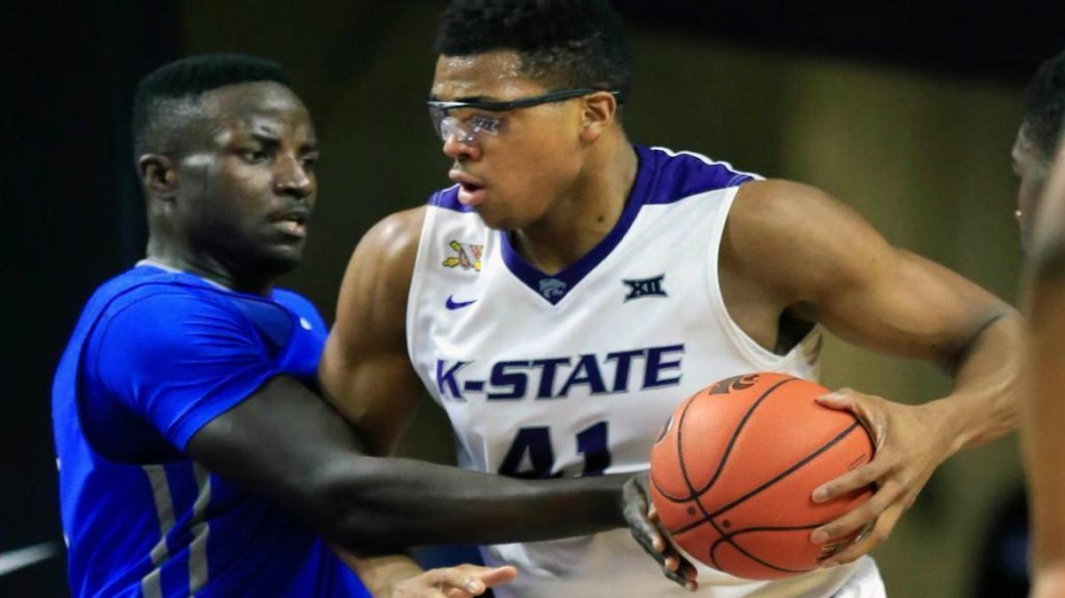 Kansas State forward Stephen Hurt (41) was covered by Saint Louis forward Reggie Agbeko in the first half of the game between the Wildcats and Billikens on Tuesday night at Bramlage Coliseum in Manhattan, Kan.
