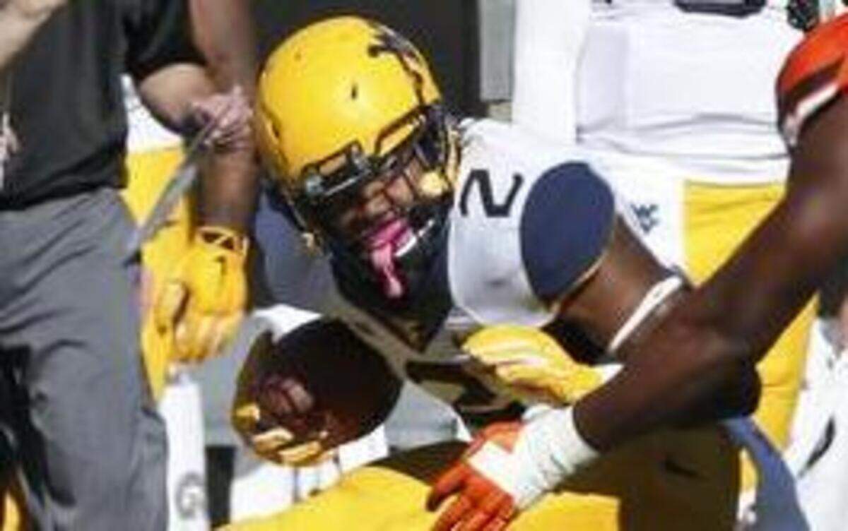 
Running back Dreamius Smith arrived at West Virginia by way of Heights High in Wichita and Butler Community College.
