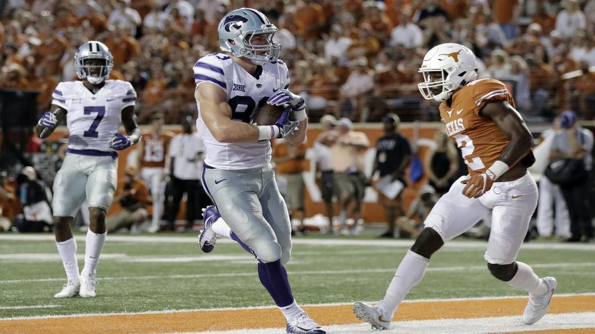 Kansas State wide receiver Dalton Schoen made a catch for a touchdown in front of Texas defensive back Kris Boyd in the first half of Saturday’s game in Austin, Texas.
