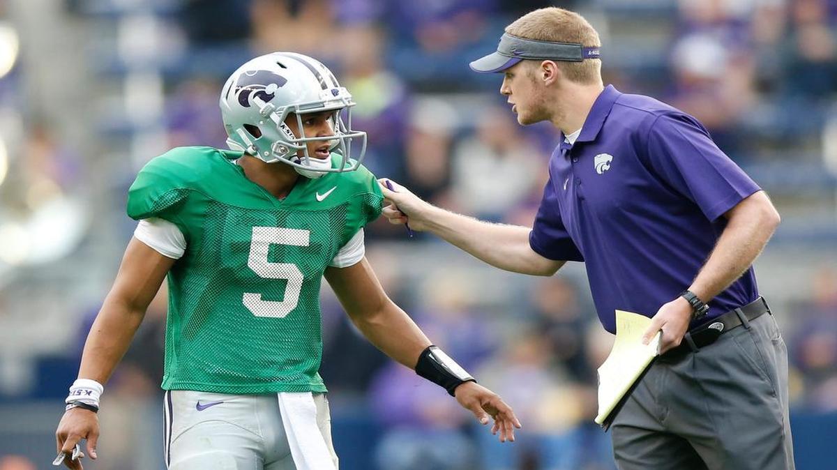 
Freshman quarterback Alex Delton got some words from graduate assistant coach Collin Klein at Kansas State’s spring game in April. Like Delton, Klein also had three others competing for the starting quarterback spot when he was a redshirt freshman in 2009.
