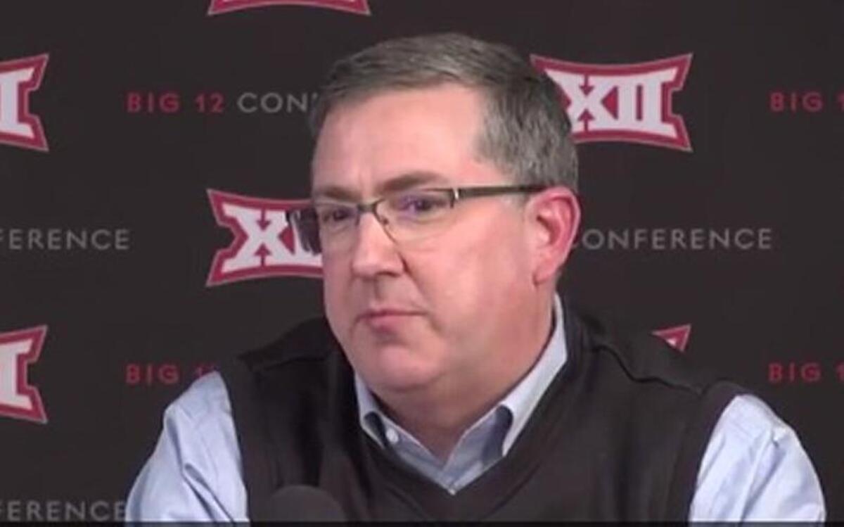 Kansas State president Kirk Schulz addresses media after Big 12 winter meetings in Dallas.