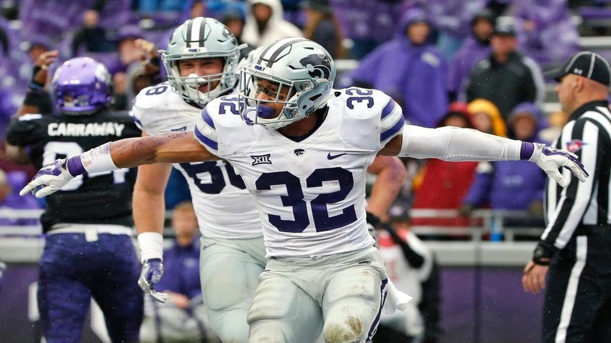 Kansas State running back Justin Silmon and tight end Dayton Valentine celebrate after Silmon ran for a touchdown against TCU on Dec. 3.