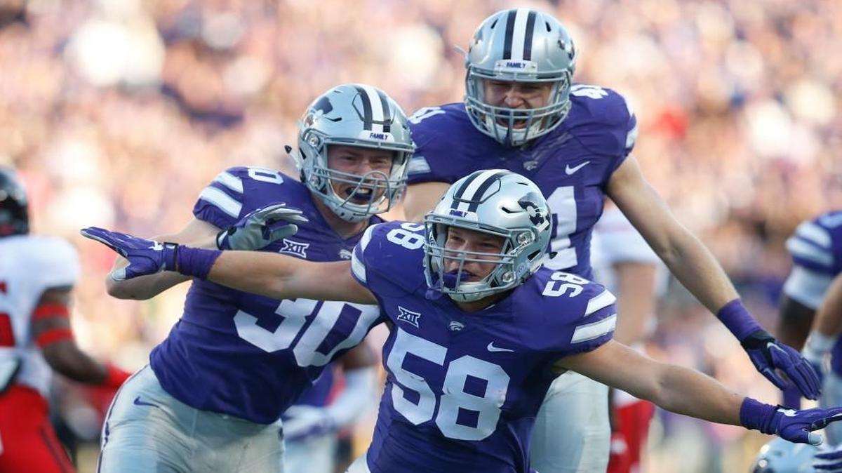 K-State linebacker Trent Tanking celebrates with defenders after a big play against Texas Tech on Oct. 8.