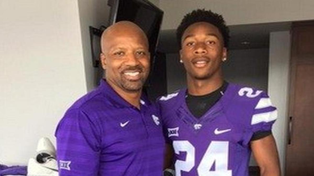
Kansas State wide receivers coach Andre Coleman, left, with recruit D.J. Render. 
