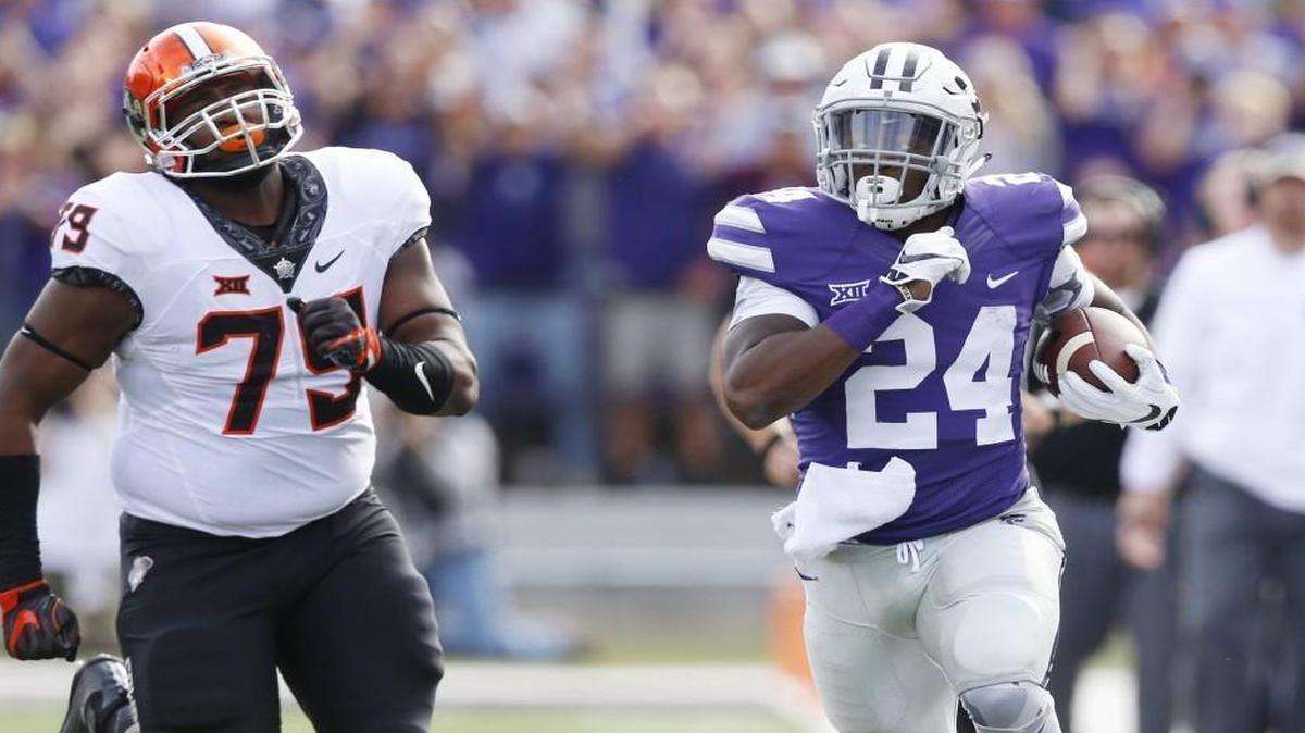 K-State running back Charles Jones sprints down the sideline during the first half Saturday in Manhattan.