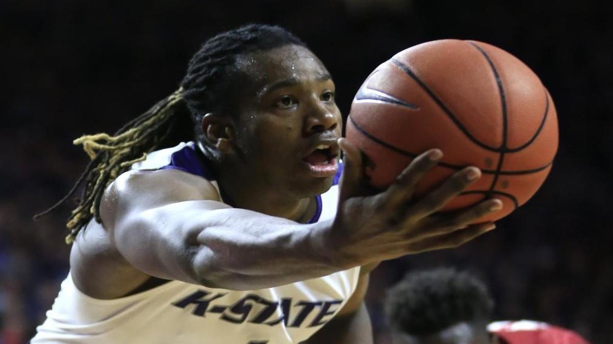 Kansas State forward D.J. Johnson grabbed a loose ball during the second half of last week’s win over Oklahoma.