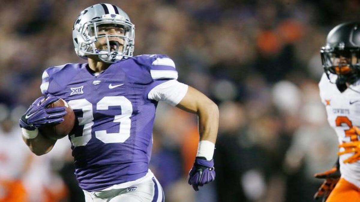 
K-State defensive back Morgan Burns takes off on an 86-yard kickoff return for a touchdown against Oklahoma State.
