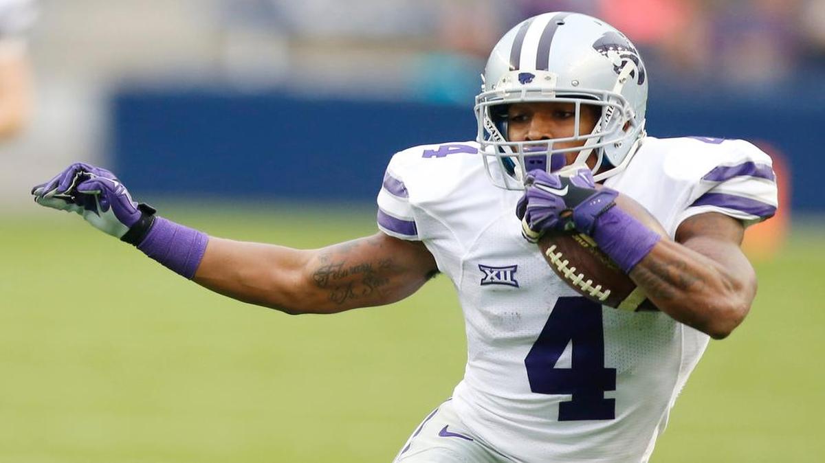 
K-State wide receiver Dominique Heath returns a punt at the Saturday’s spring game in Kansas City, Kan.

