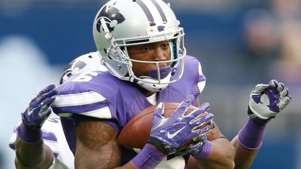 
Deante Burton snags a pass from Jesse Ertz during the K-State spring game Saturday in Kansas City, Kan.
