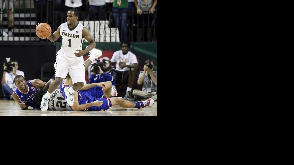 
Baylor’s Kenny Chery came away with a steal in front of Kansas’ Cliff Alexander (bottom left) and Perry Ellis during a game earlier this month.
