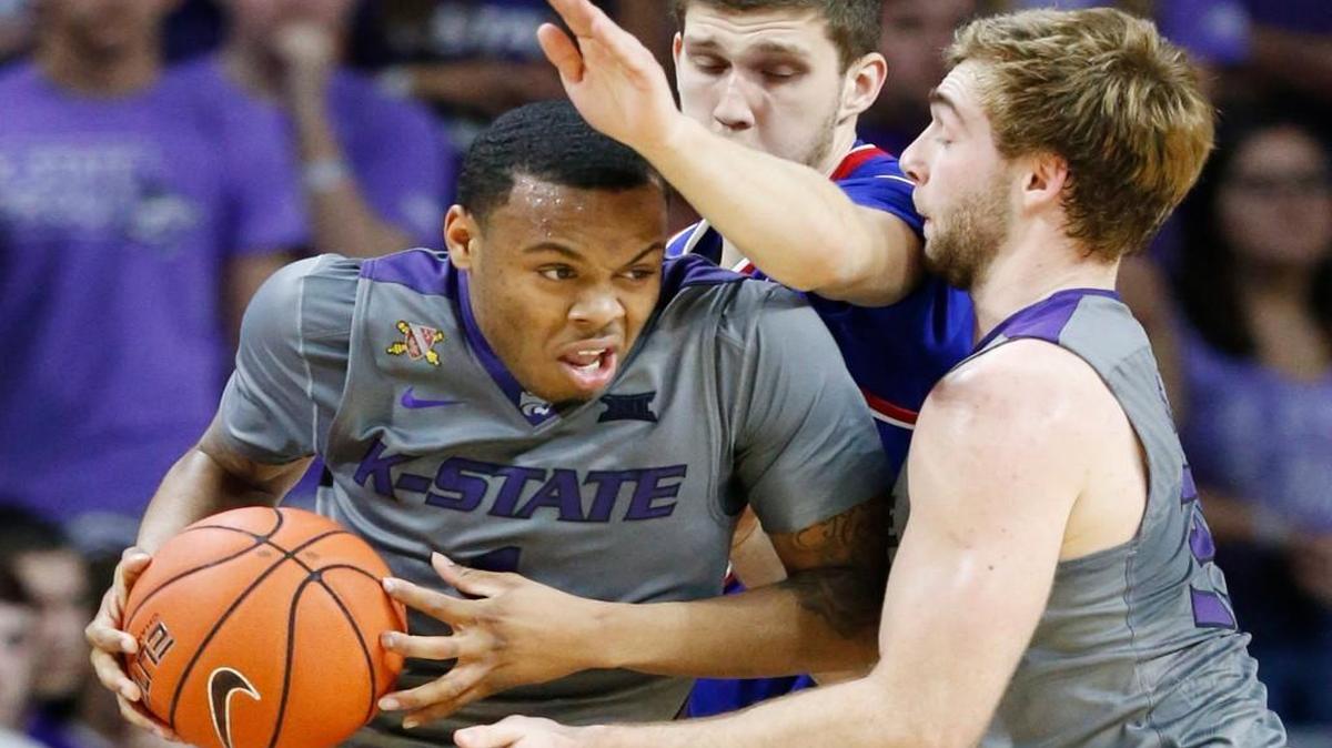 K-State guard Carlbe Ervin looks for a route to the basket during a game last season.