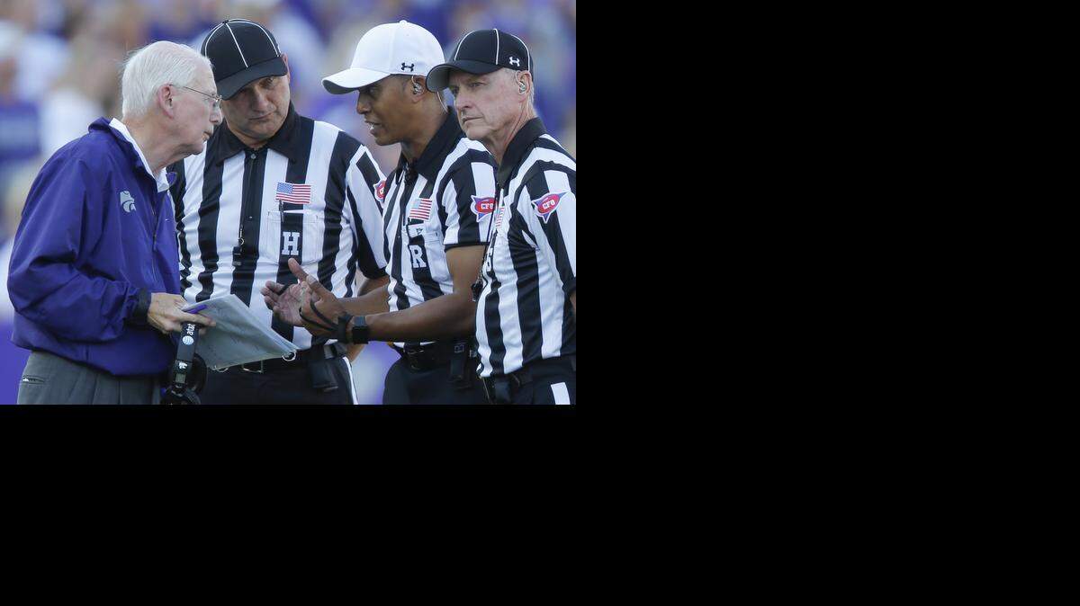 
Kansas State coach Bill Snyder talks with the officials during the first half against Stephen F. Austin on Saturday night at Bill Snyder Family Stadium.
