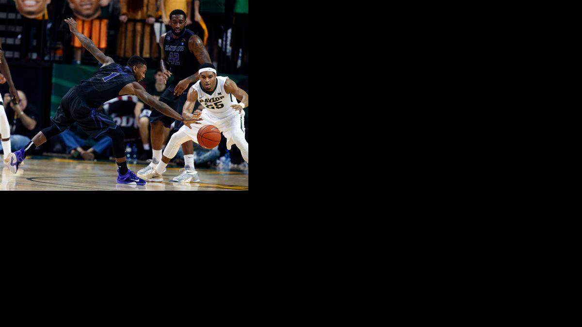 
Kansas State guard Jevon Thomas (left) reached for a pass intended for Baylor guard Al Freeman in the second half Saturday.


