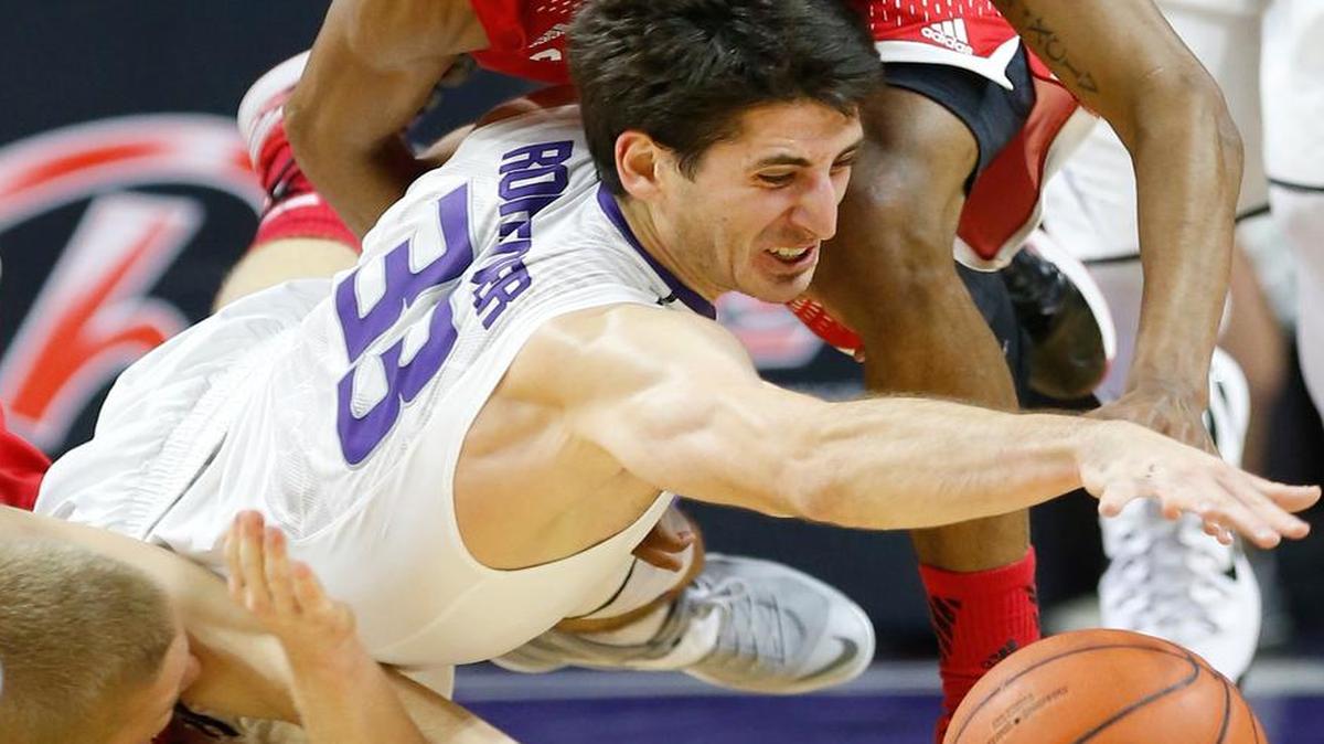 
K-State guard Brian Rohleder dives for a loose ball under the K-State basket against Southern Utah.(November 14, 2014)
