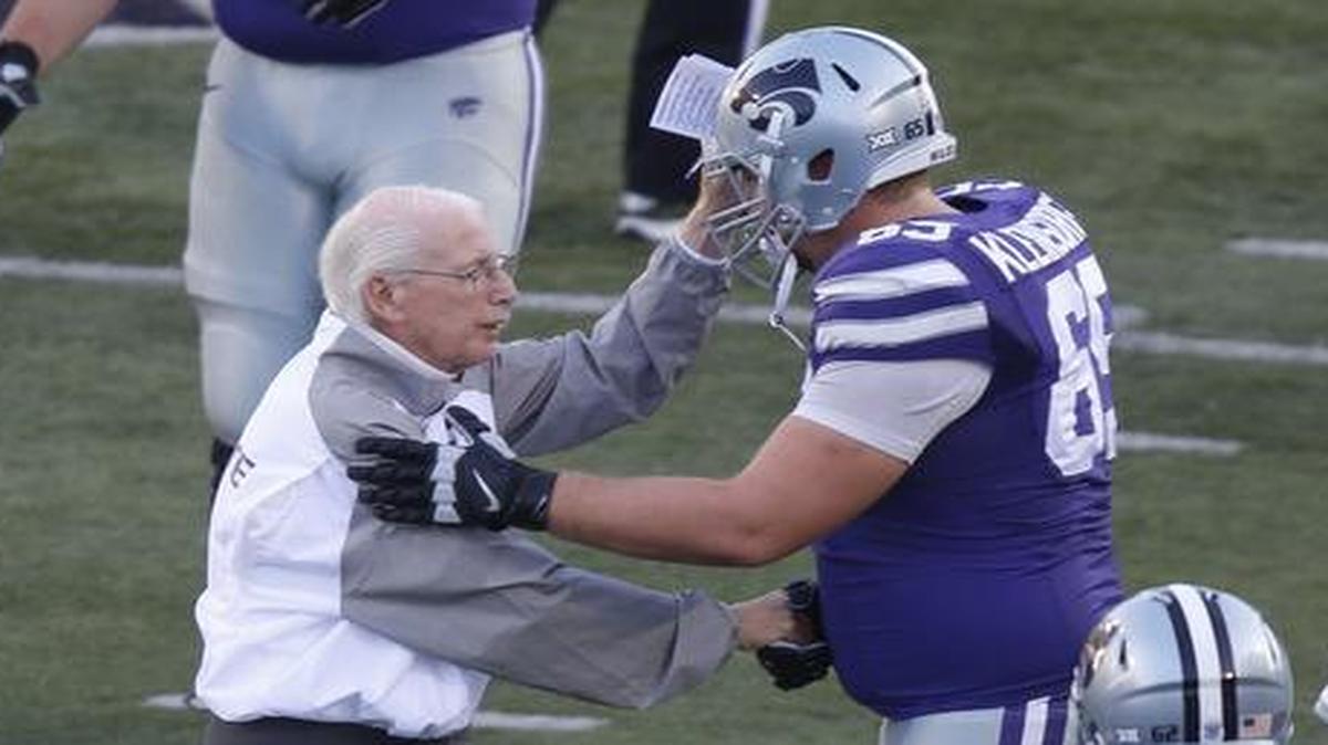 K-State coach Bill Snyder takes time to wish each one of his players well before the start of the game Oct. 10.